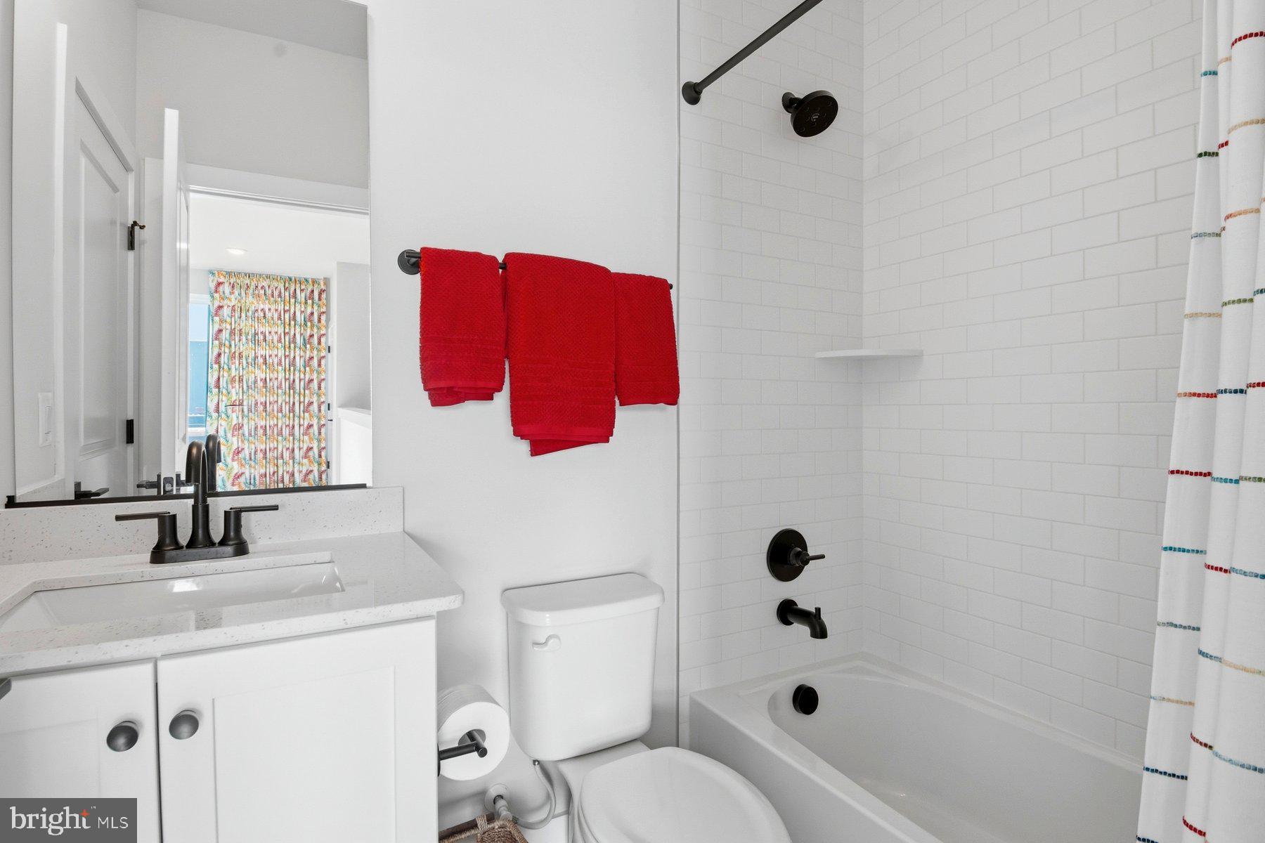 100 Glass Lane Baltimore, MD 21230 - Photo 29 of 36 a bathroom with a sink toilet and shower