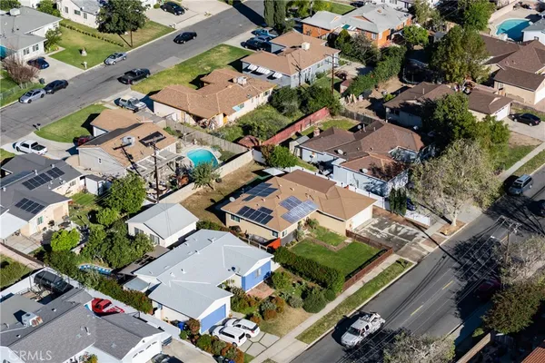 an aerial view of a city with lots of residential buildings