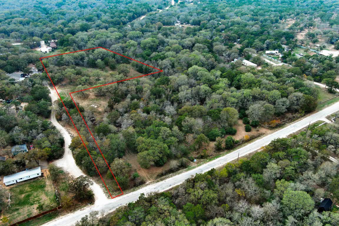 233 The Forest Road Dale, TX 78616 - Photo 2 of 15 an aerial view of forest