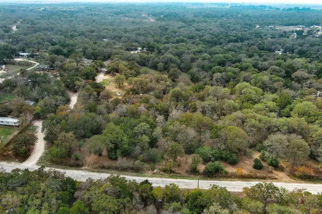 an aerial view of residential house with outdoor space