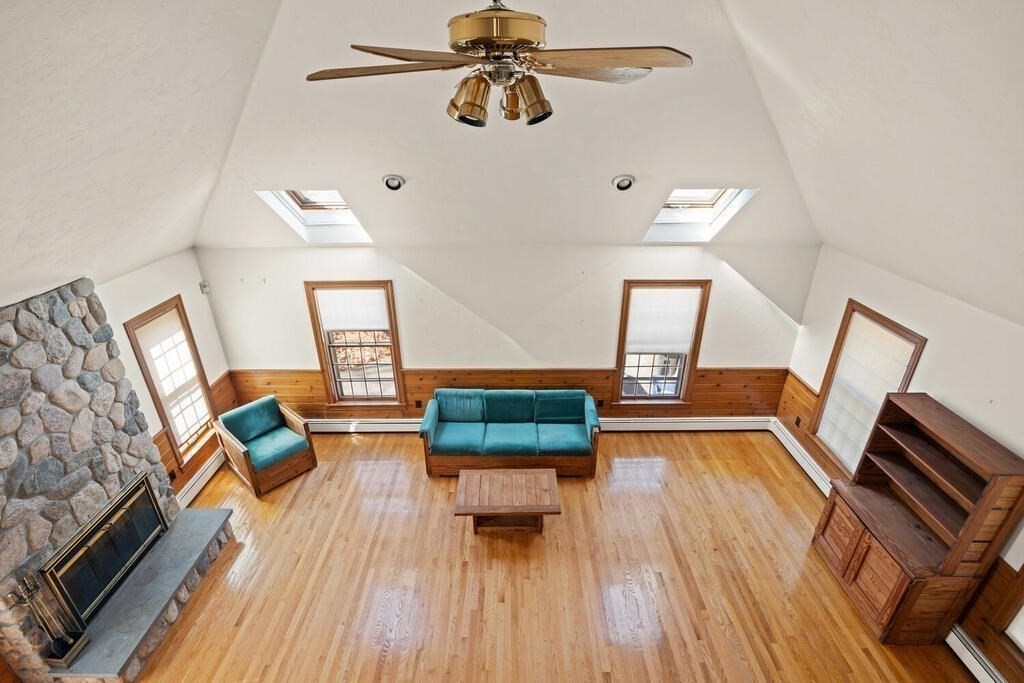 3 Royal Circle Lexington, MA 02420 - Photo 14 of 42 a living room with furniture and a wooden floor