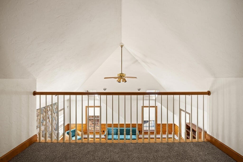 3 Royal Circle Lexington, MA 02420 - Photo 15 of 42 a view of staircase with floor to ceiling window