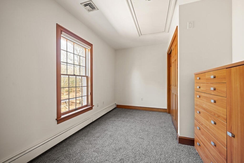 3 Royal Circle Lexington, MA 02420 - Photo 19 of 42 an empty room with windows