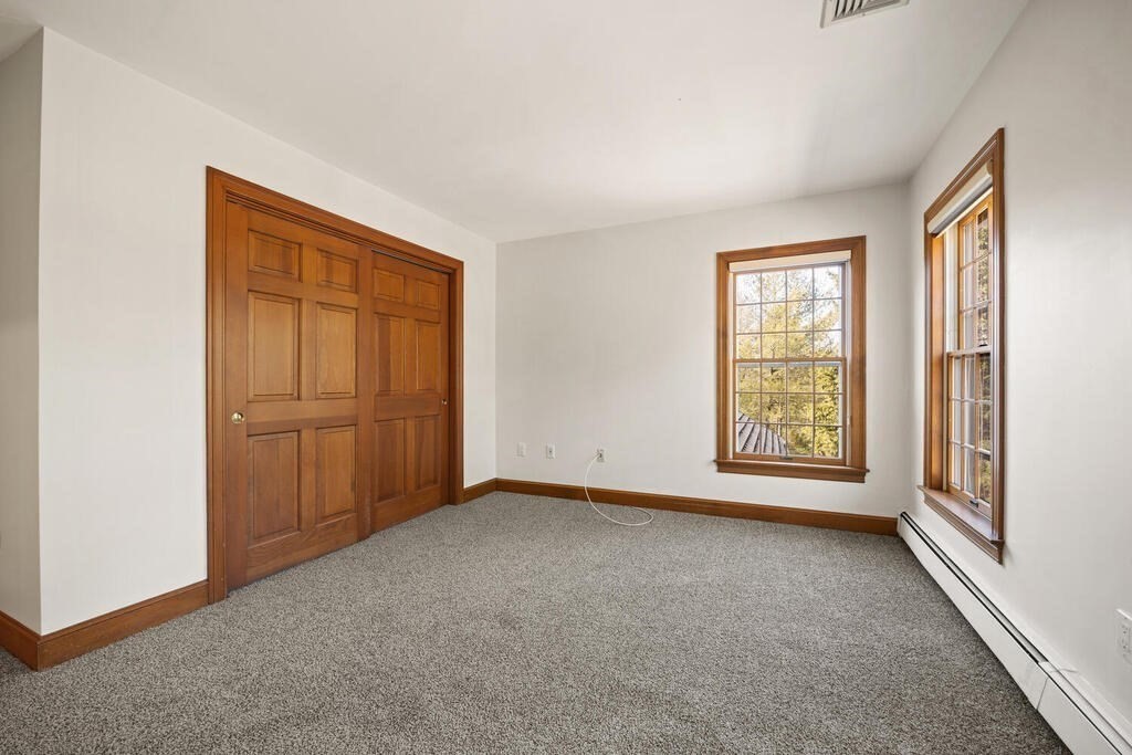 3 Royal Circle Lexington, MA 02420 - Photo 21 of 42 a view of an empty room with a window