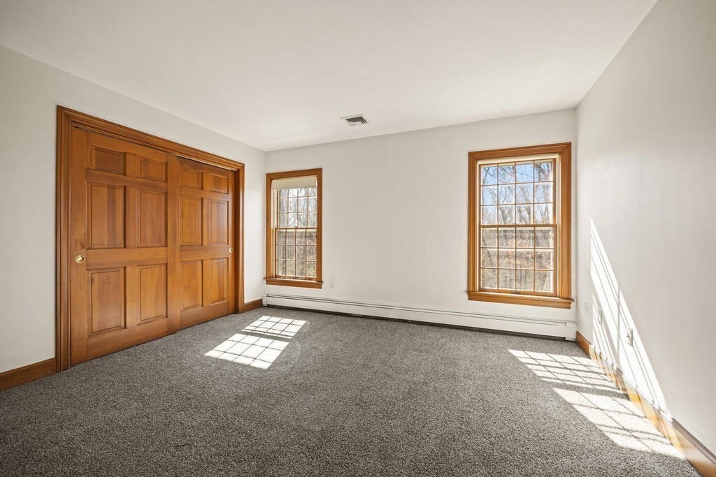 3 Royal Circle Lexington, MA 02420 - Photo 22 of 42 a view of empty room with windows