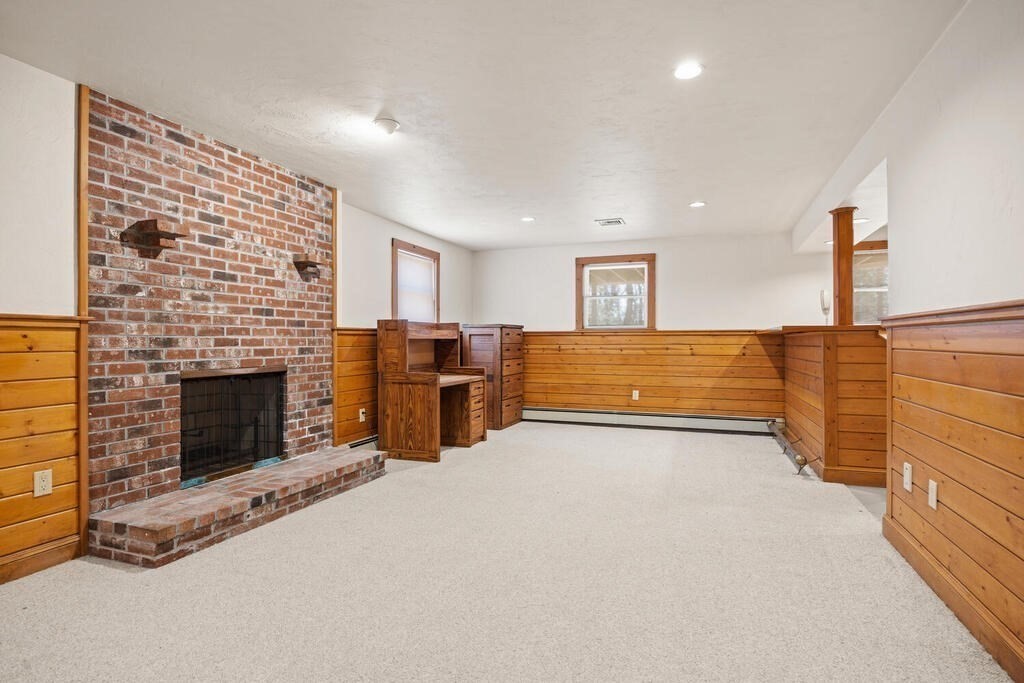 3 Royal Circle Lexington, MA 02420 - Photo 29 of 42 a view of a livingroom with a fireplace
