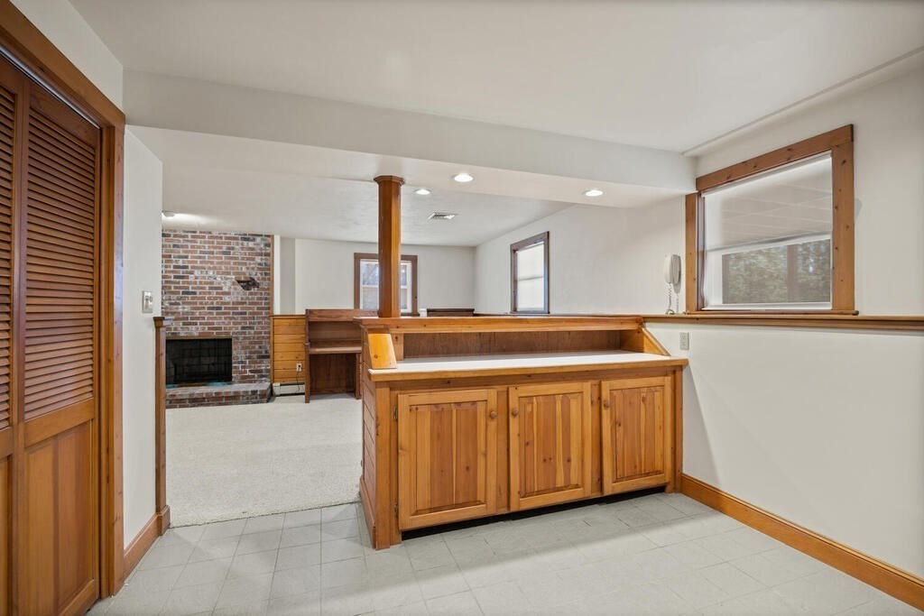 3 Royal Circle Lexington, MA 02420 - Photo 32 of 42 a large white kitchen with a large window