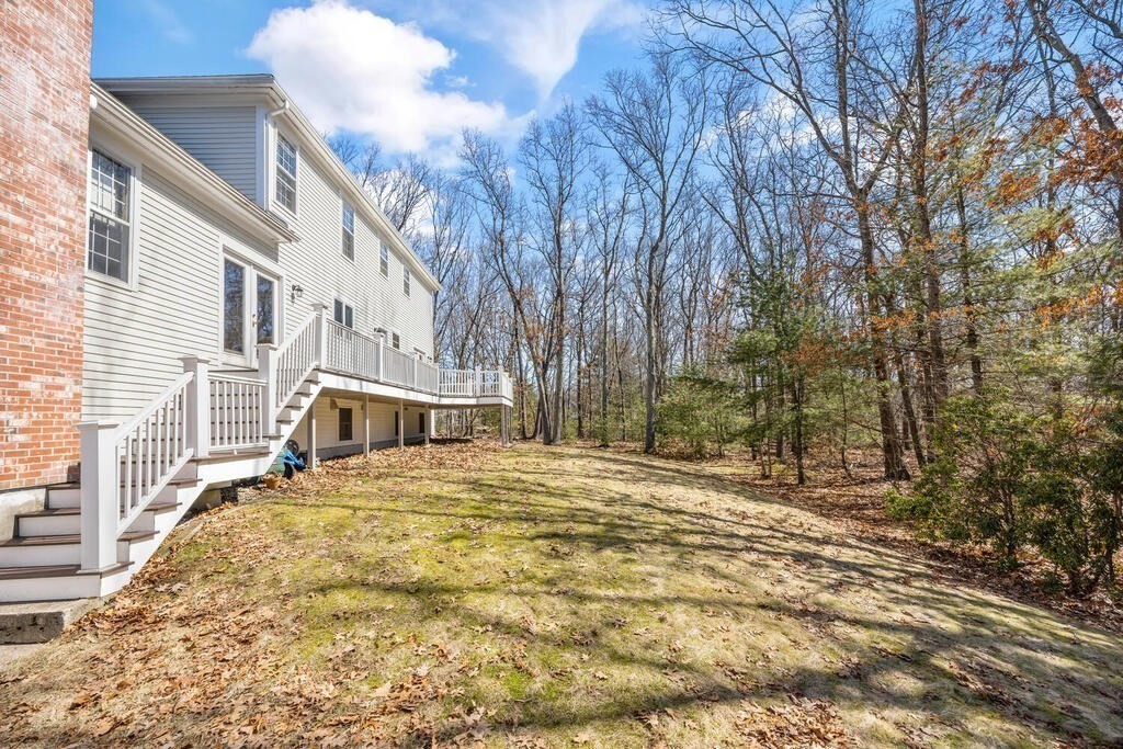 3 Royal Circle Lexington, MA 02420 - Photo 36 of 42 a view of an house with backyard and trees