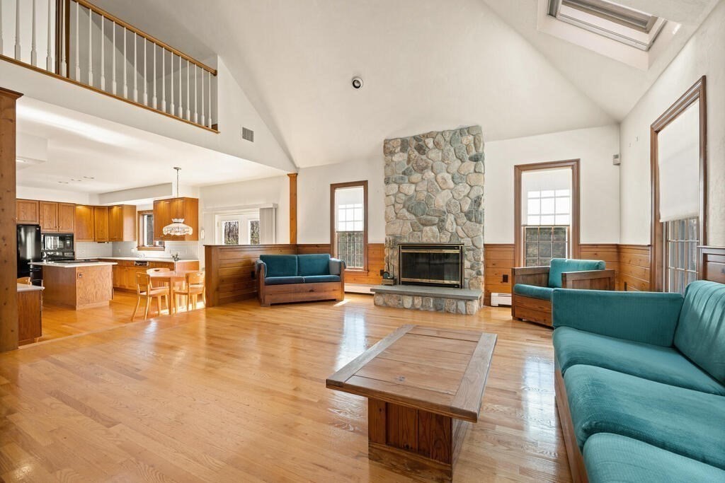 3 Royal Circle Lexington, MA 02420 - Photo 10 of 42 a living room with furniture and a fireplace