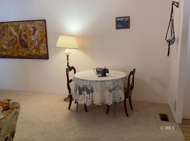 2263 Darby Avenue Bishop, CA 93514 - Photo 12 of 23 a dining room with furniture and wooden floor