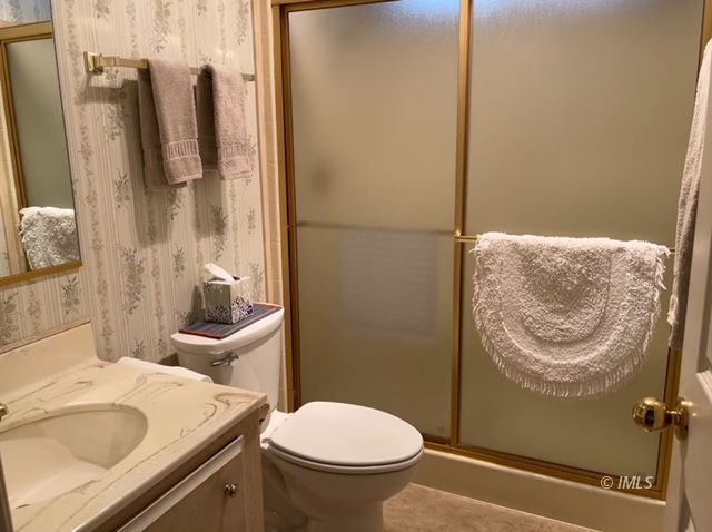 2263 Darby Avenue Bishop, CA 93514 - Photo 15 of 23 a bathroom with a sink toilet and shower