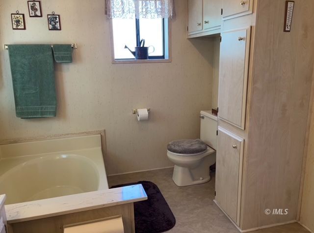 2263 Darby Avenue Bishop, CA 93514 - Photo 18 of 23 a bathroom with a toilet and a shower
