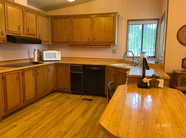 2263 Darby Avenue Bishop, CA 93514 - Photo 5 of 23 a kitchen with sink and cabinets