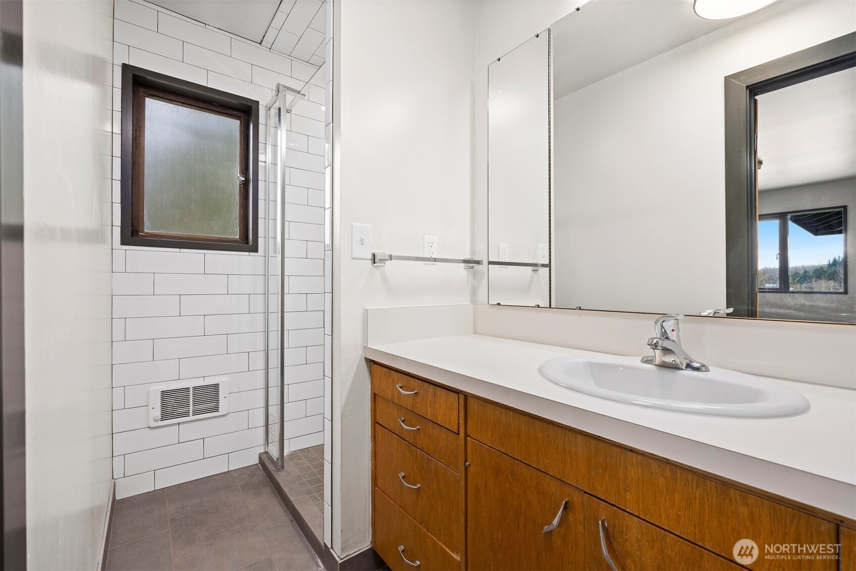 18928 Bow Hill Road Burlington, WA 98233 - Photo 18 of 39 a bathroom with a sink and a mirror