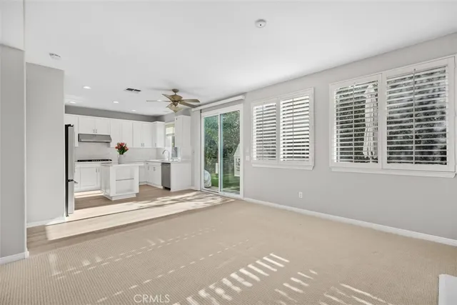 a view of a room with a large window