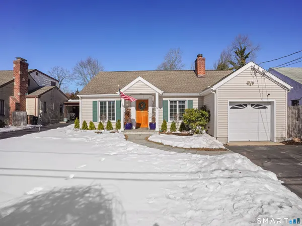a front view of a house with yard