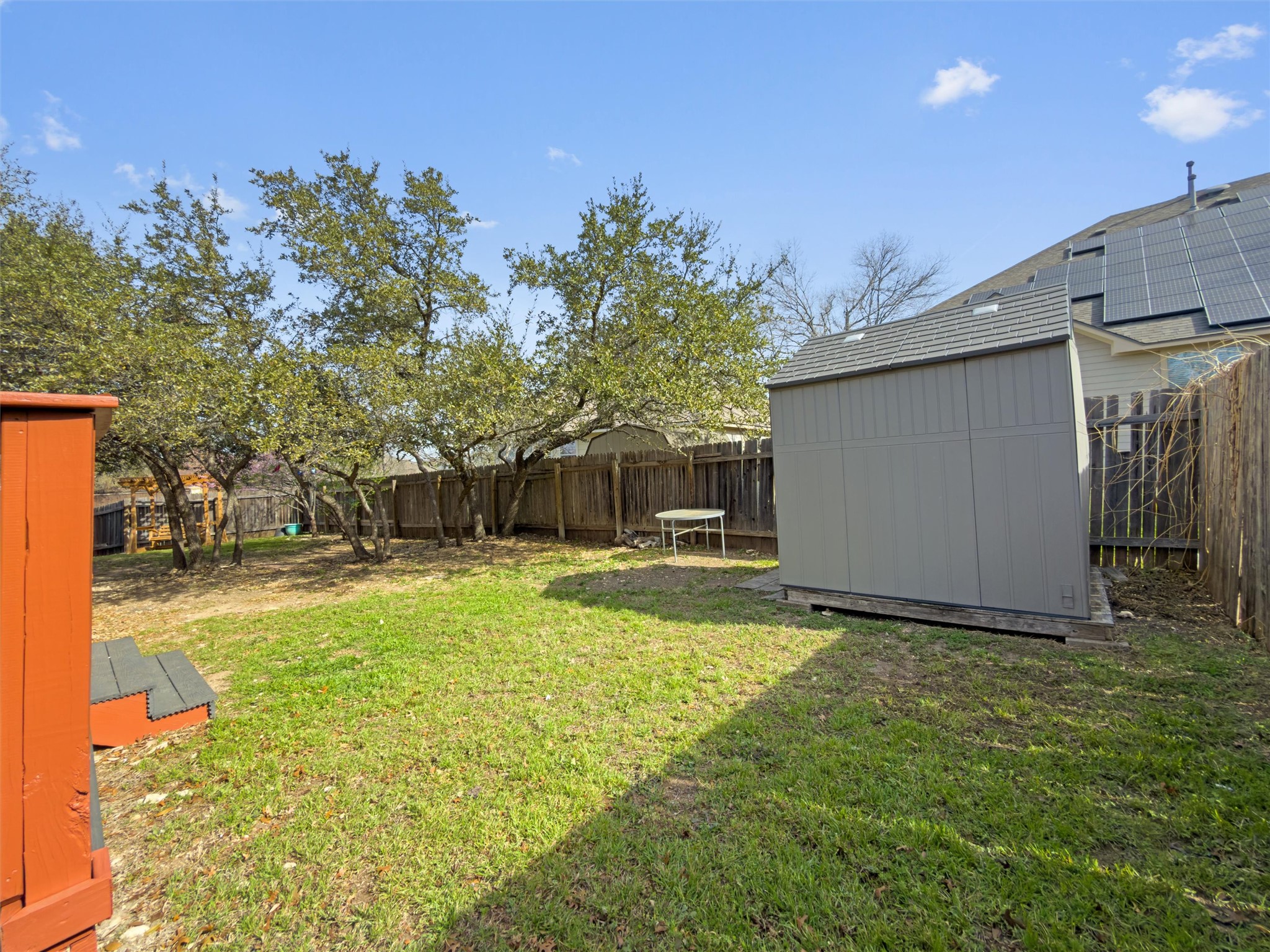 400 Red Hawk Drive Leander, TX 78641 - Photo 26 of 32 Fenced backyard with a storage unit