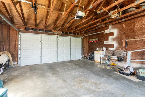 a view of a room with wooden walls