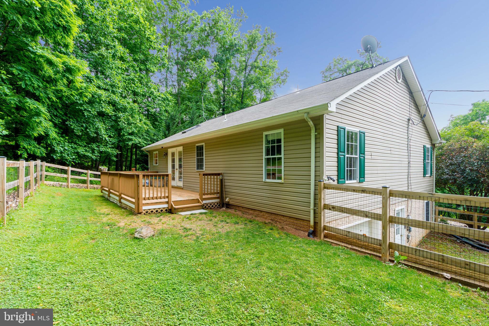 956 Wilderness Road Linden, VA 22642 - Photo 36 of 42 Rear Fully Fenced Yard with Deck