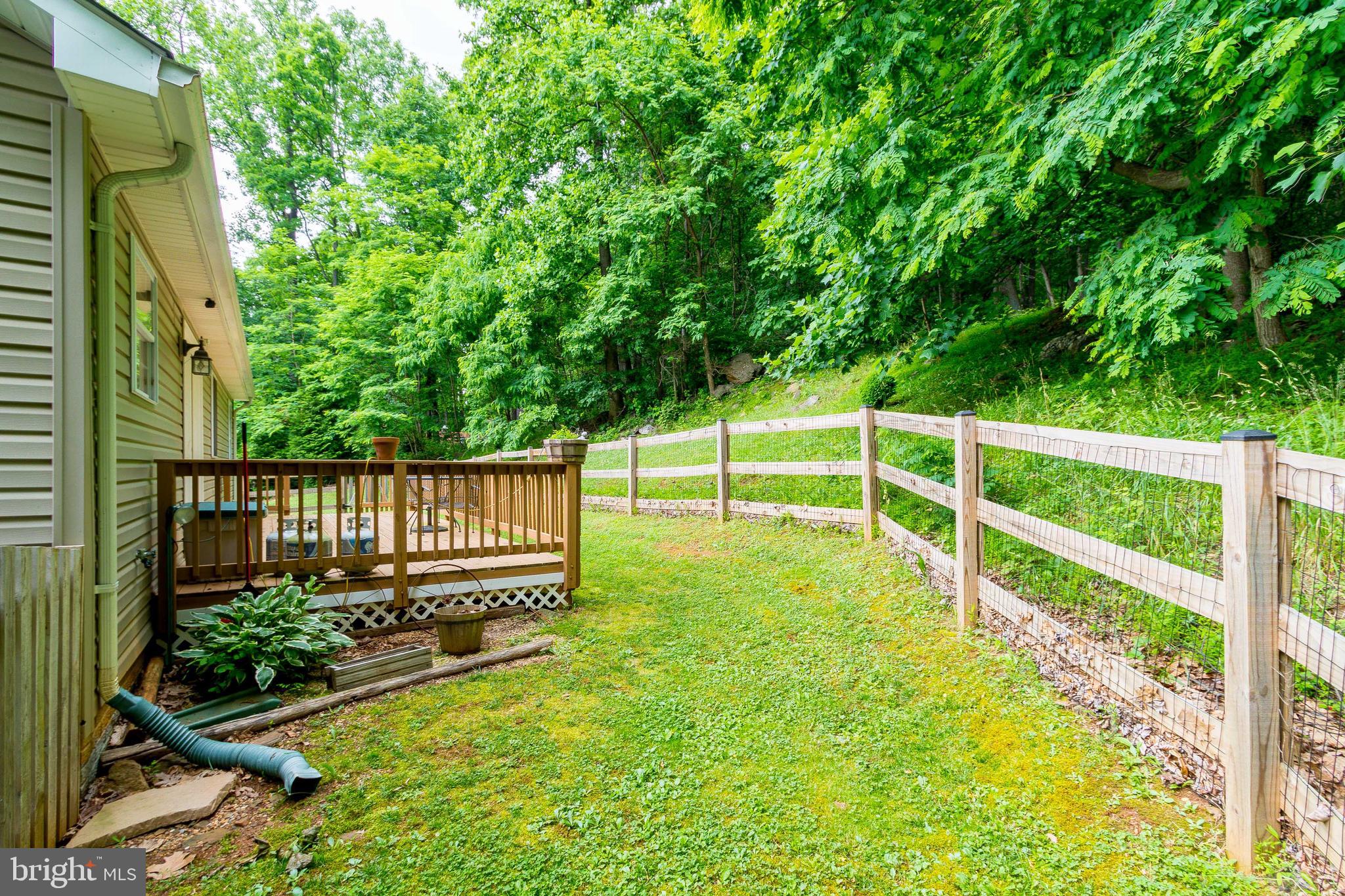 956 Wilderness Road Linden, VA 22642 - Photo 38 of 42 Rear Fully Fenced Yard with Deck