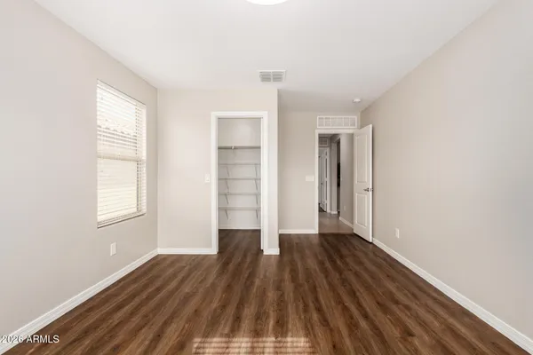 a view of an empty walk in closet