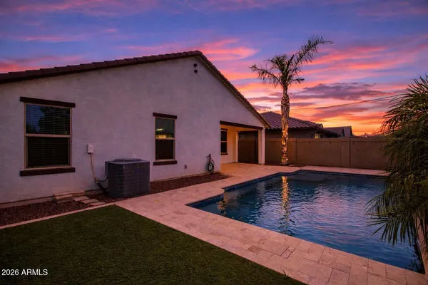 a view of a house with a swimming pool