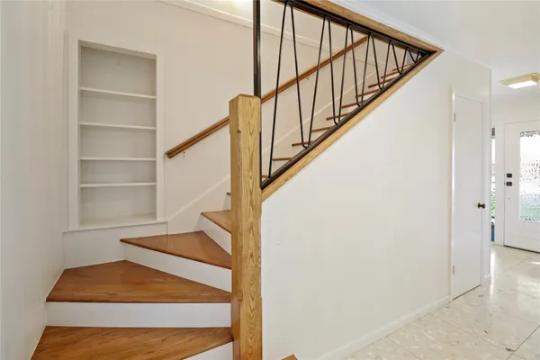 a bathroom with a double vanity sink and mirror