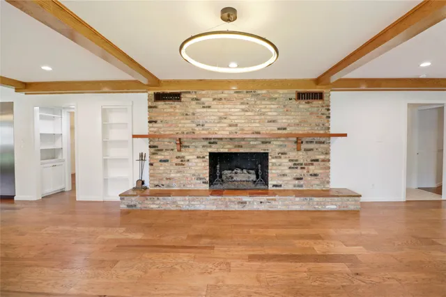 a bathroom with a granite countertop sink double vanity and a mirror