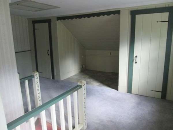 52 Emery Road Townsend, MA 01469 - Photo 8 of 23 a view of a hallway with wooden floor and entryway