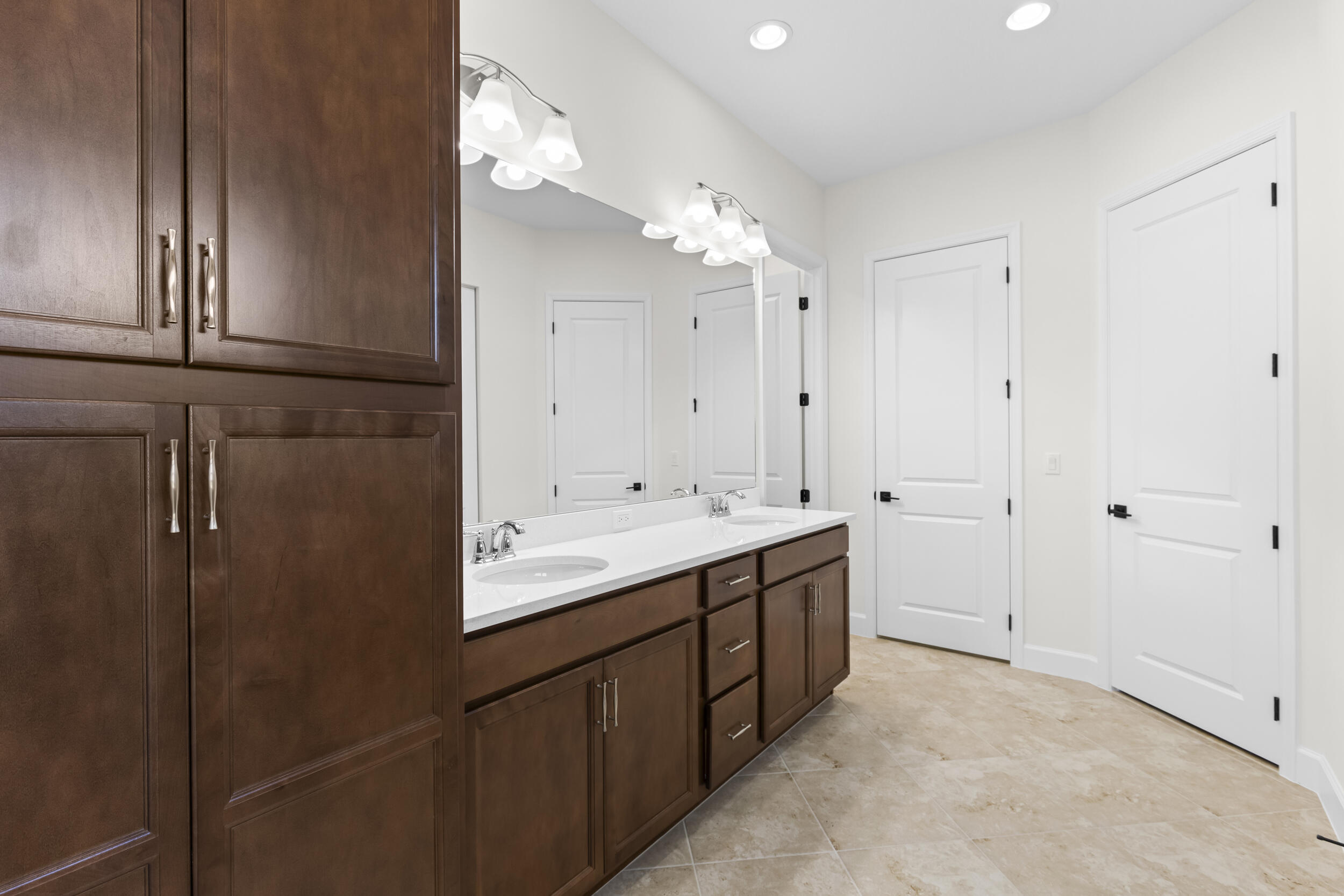 14159 Gray Bark Bend Westlake, FL 33470 - Photo 46 of 87 a bathroom with a double vanity sink and mirror
