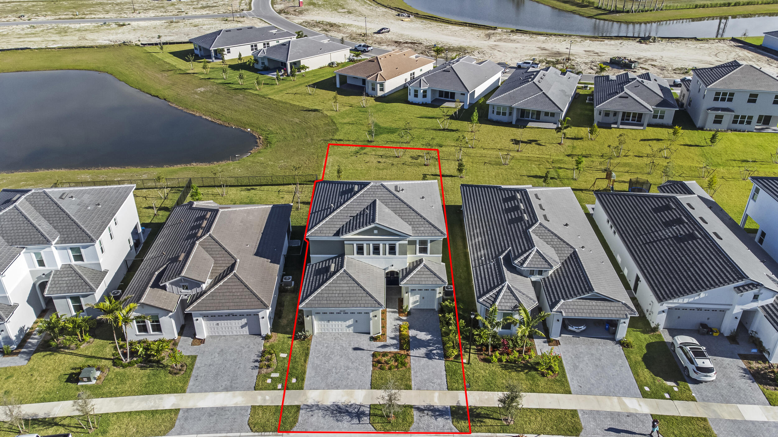 14159 Gray Bark Bend Westlake, FL 33470 - Photo 53 of 87 an aerial view of residential houses with outdoor space