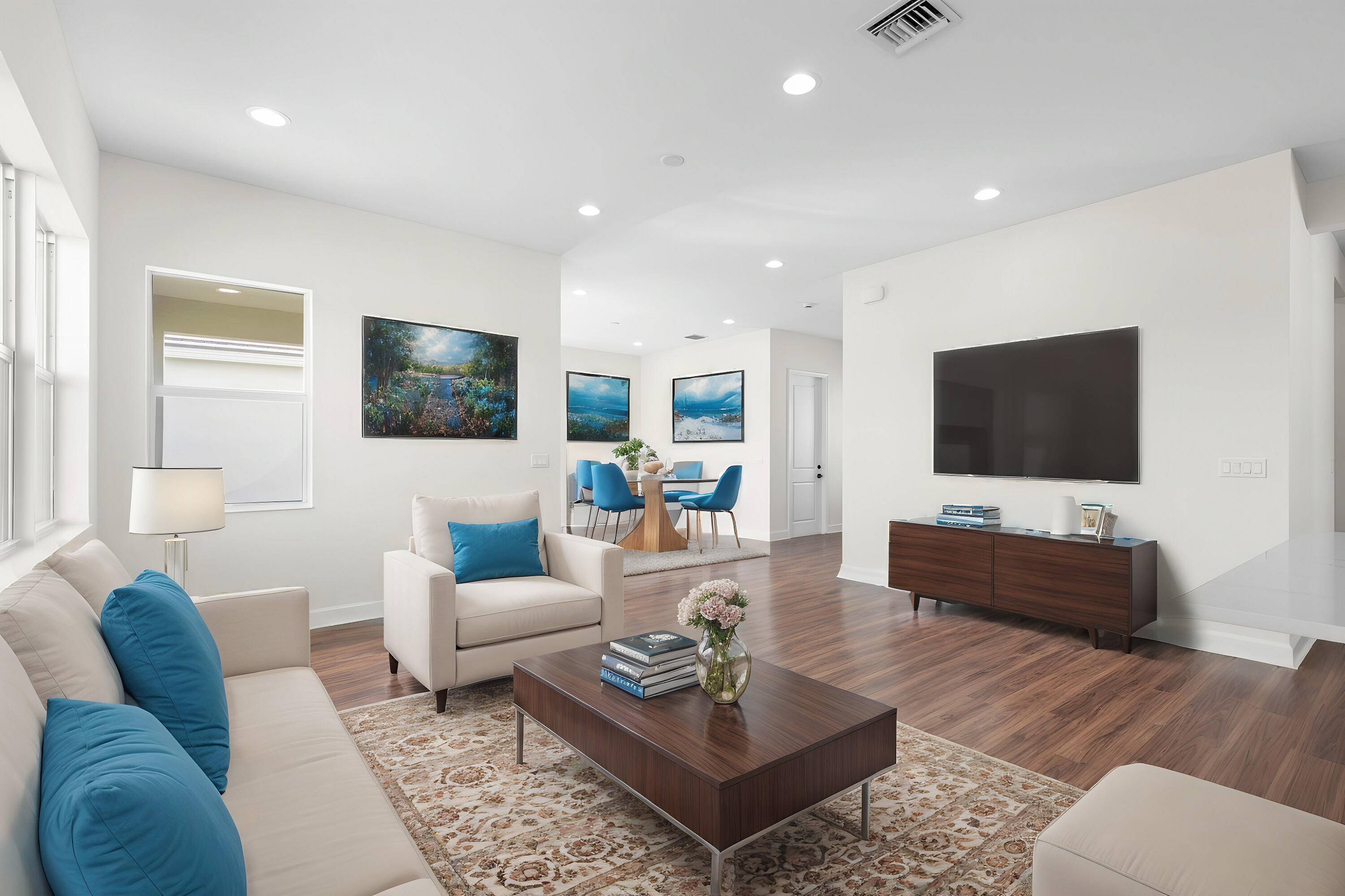 14159 Gray Bark Bend Westlake, FL 33470 - Photo 61 of 87 a living room with furniture and a flat screen tv