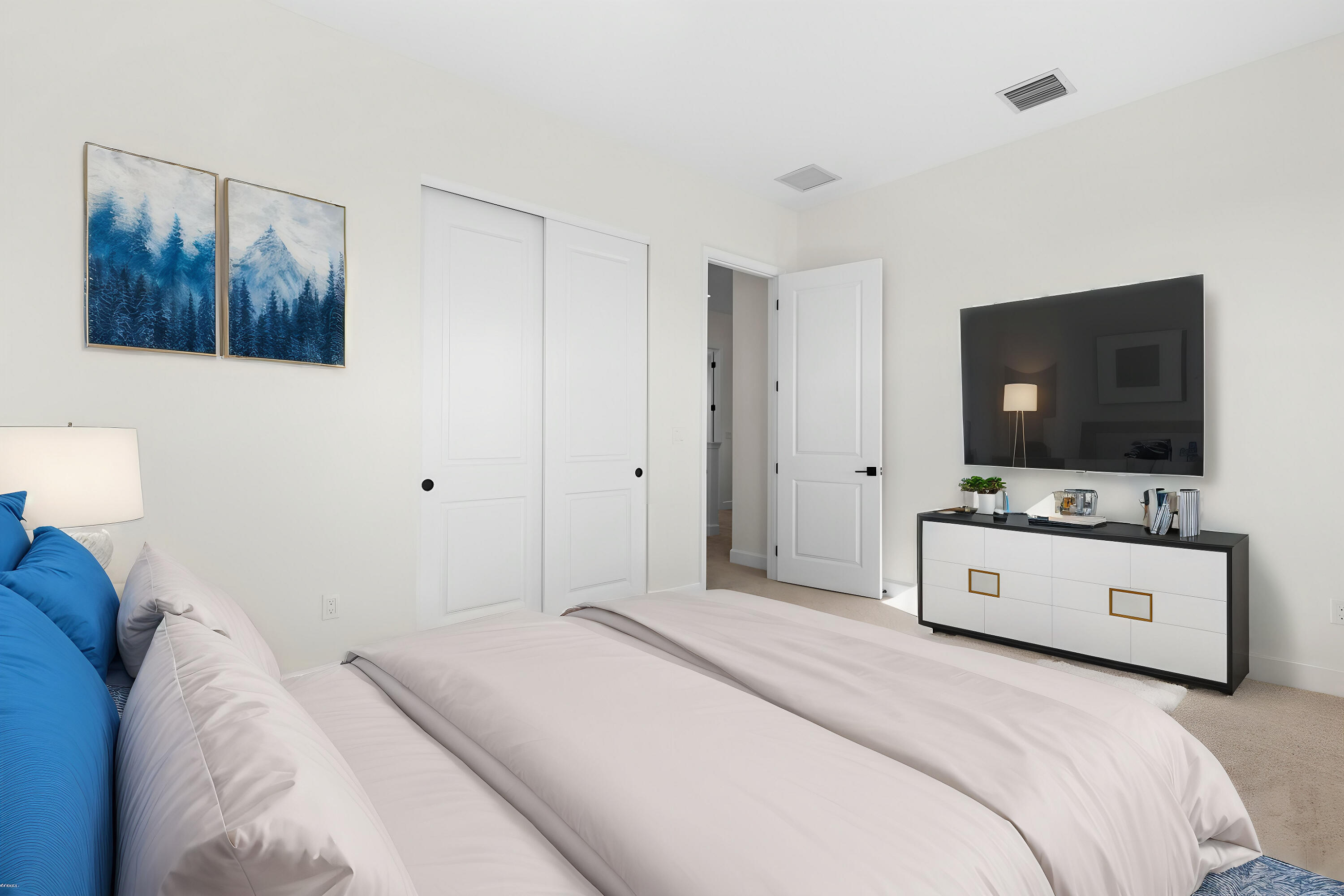 14159 Gray Bark Bend Westlake, FL 33470 - Photo 67 of 87 a bedroom with a bed and a flat screen tv