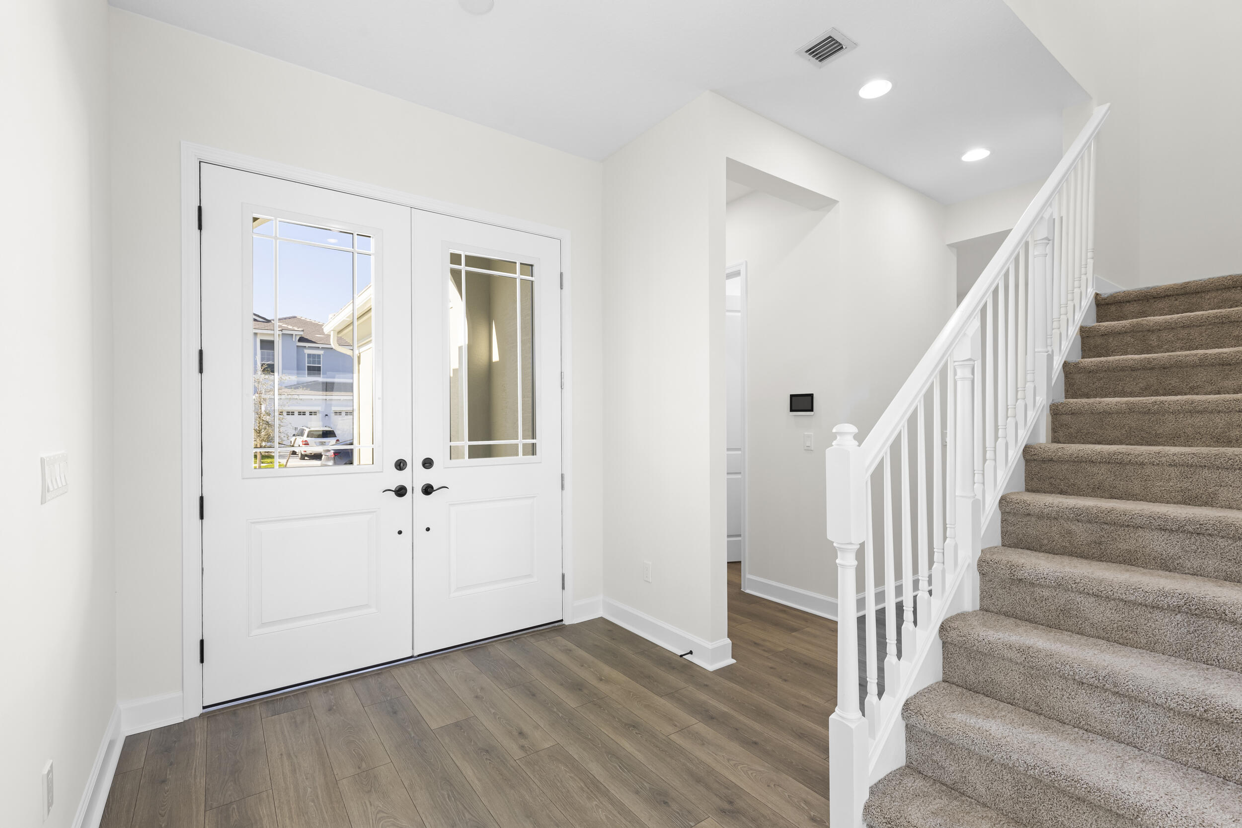 14159 Gray Bark Bend Westlake, FL 33470 - Photo 7 of 87 a view of an entryway with wooden floor