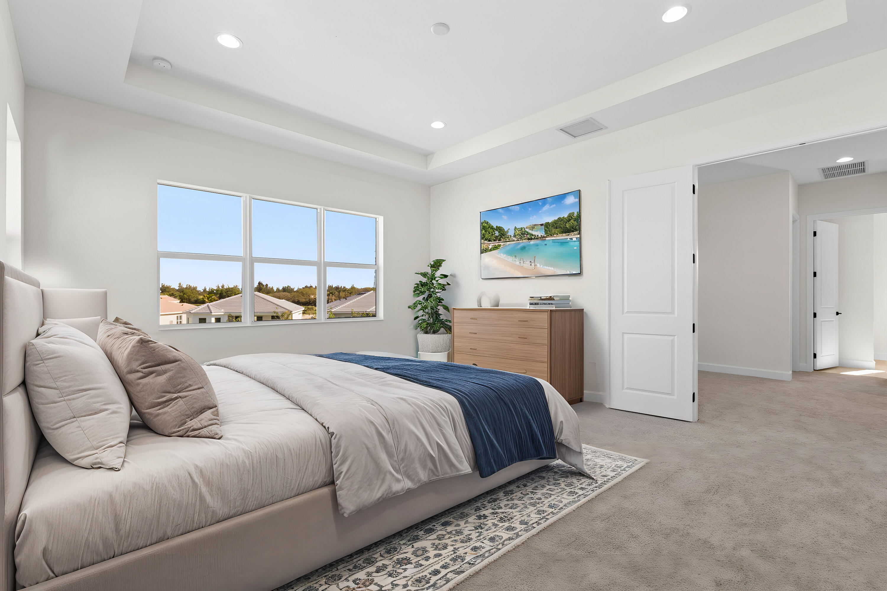 14159 Gray Bark Bend Westlake, FL 33470 - Photo 72 of 87 a bedroom with a large bed and a window