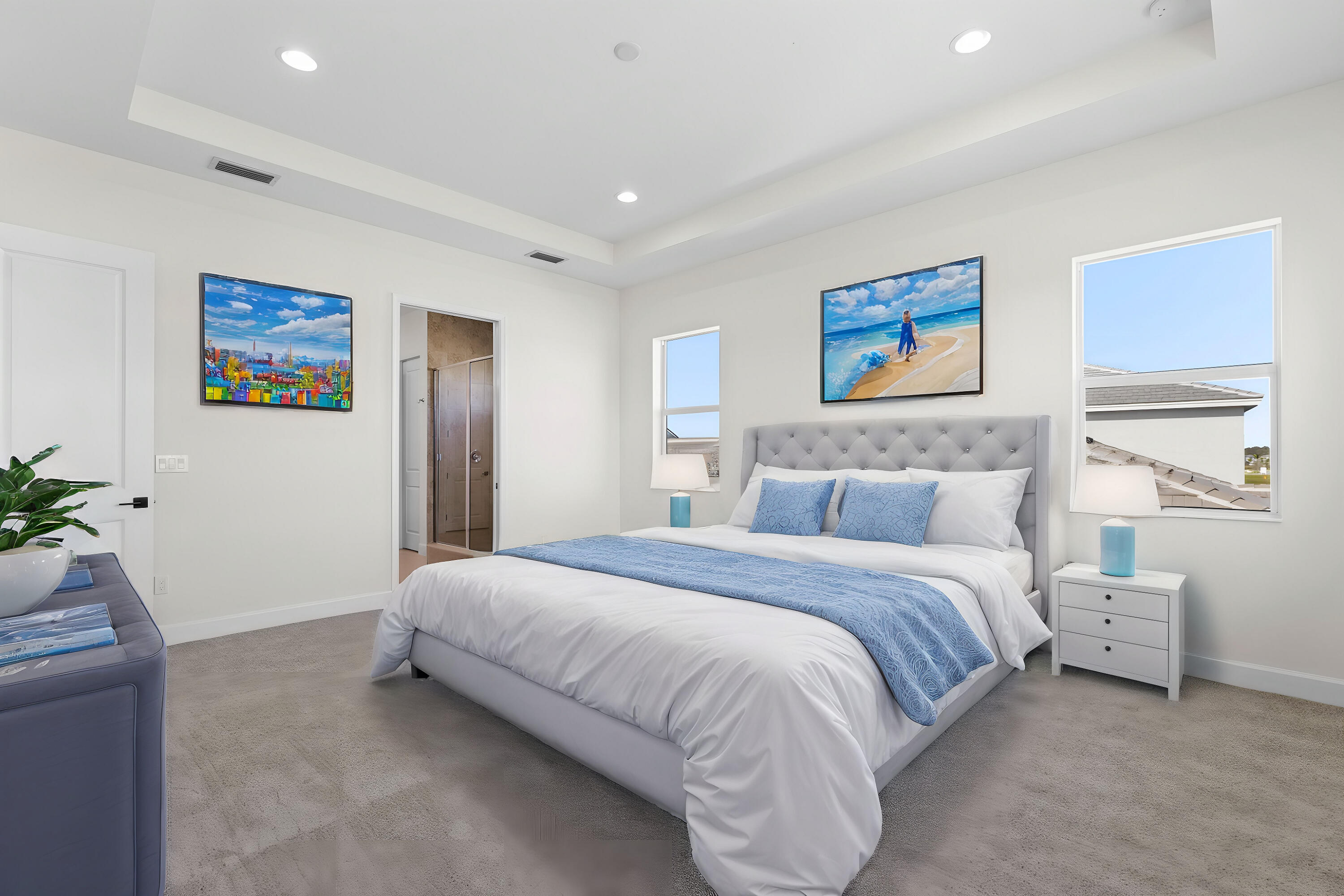 14159 Gray Bark Bend Westlake, FL 33470 - Photo 74 of 87 a spacious bedroom with a bed and a painting on the wall