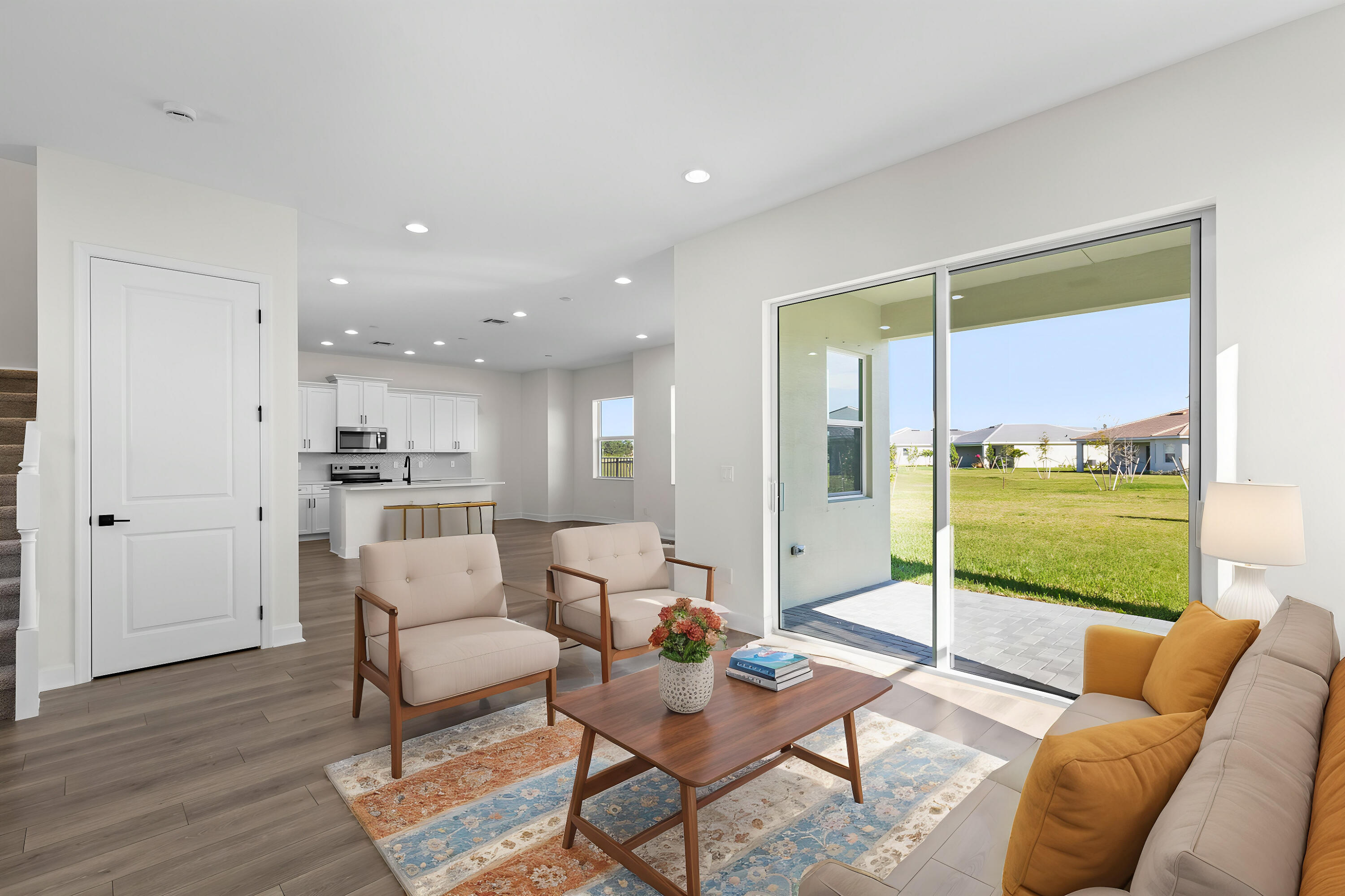 14159 Gray Bark Bend Westlake, FL 33470 - Photo 75 of 87 a living room with furniture and a floor to ceiling window