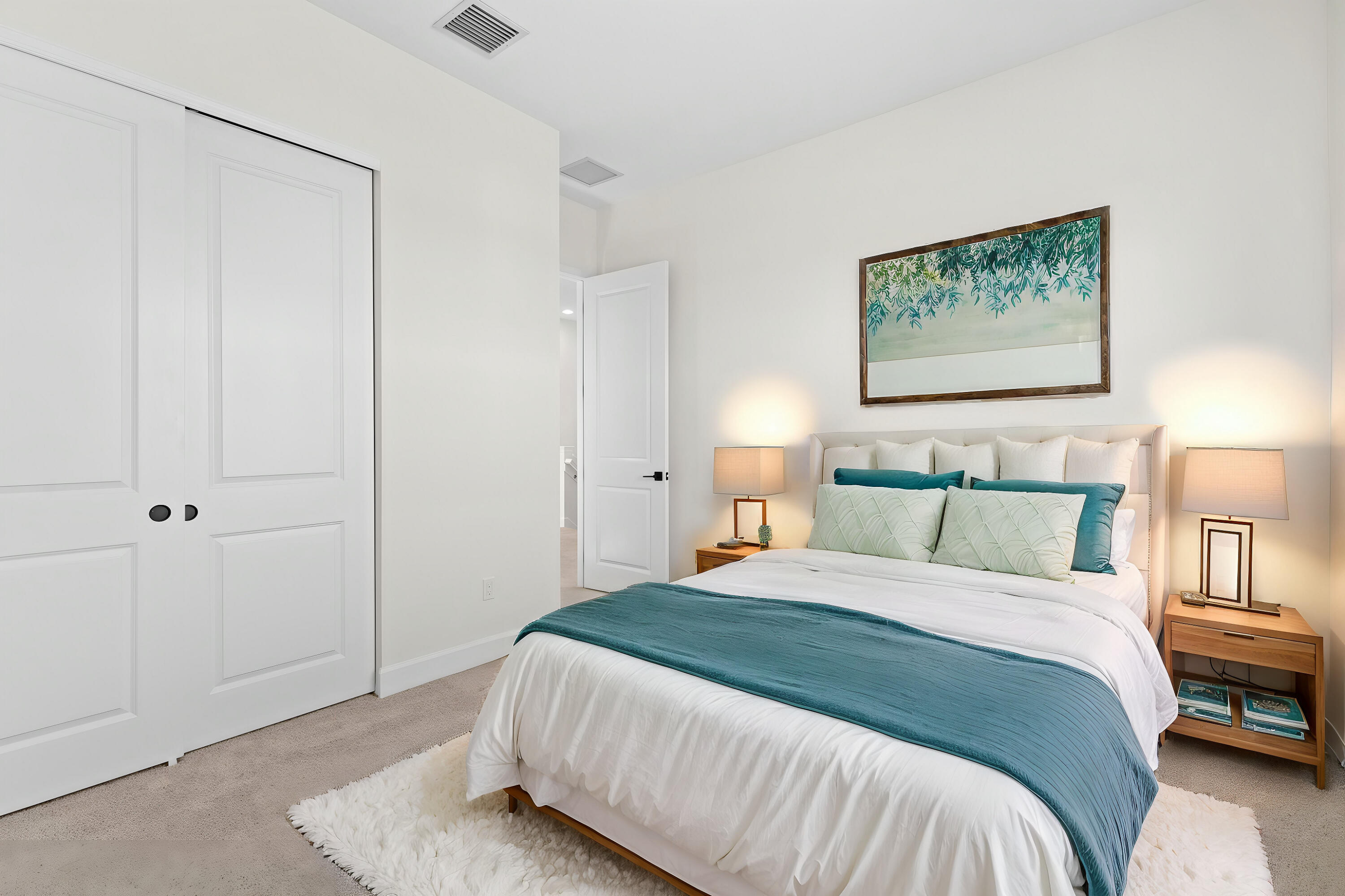 14159 Gray Bark Bend Westlake, FL 33470 - Photo 77 of 87 a bedroom with a bed and painting on the wall