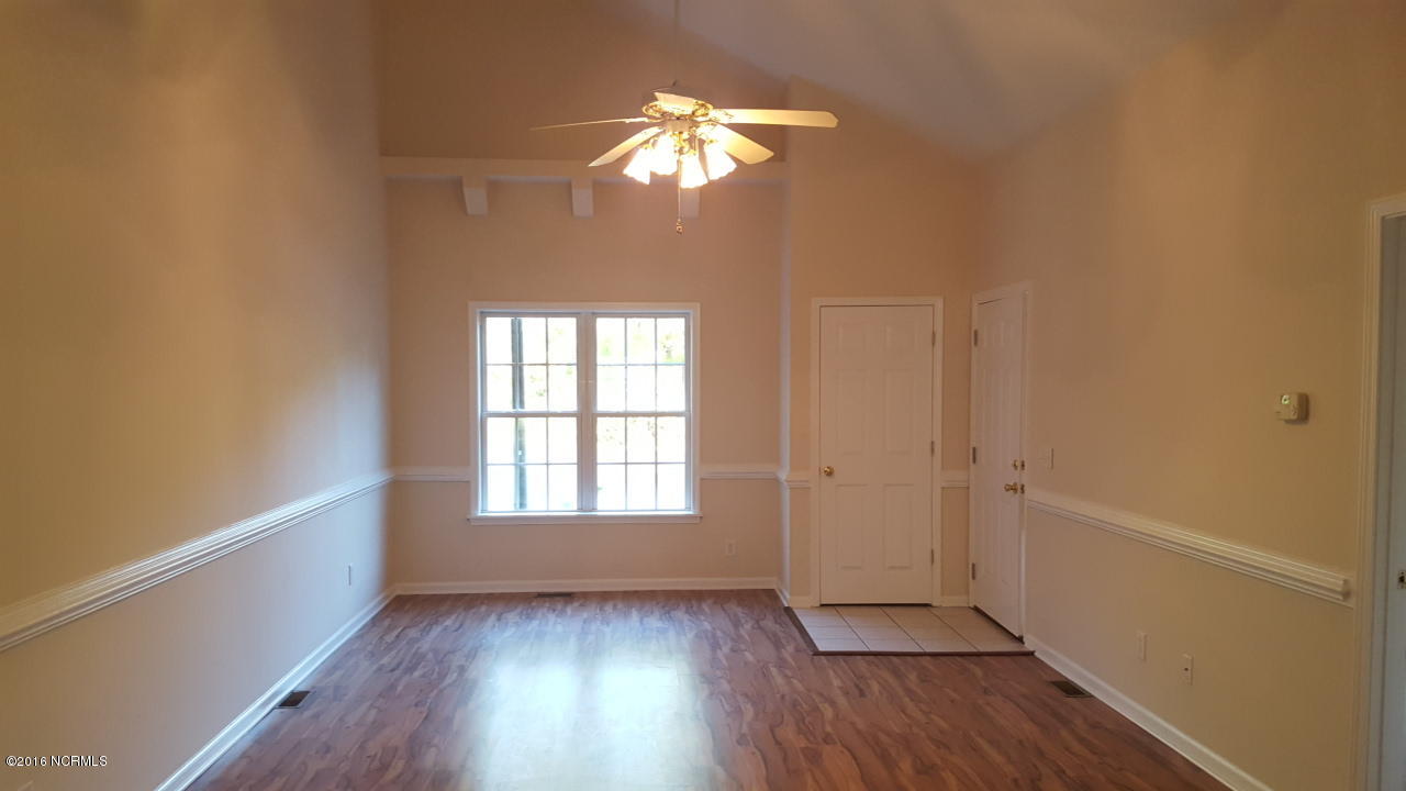 255 Beasley Road, Unit A Wilmington, NC 28409 - Photo 6 of 16 Family Room From Kitchen to the Front Door