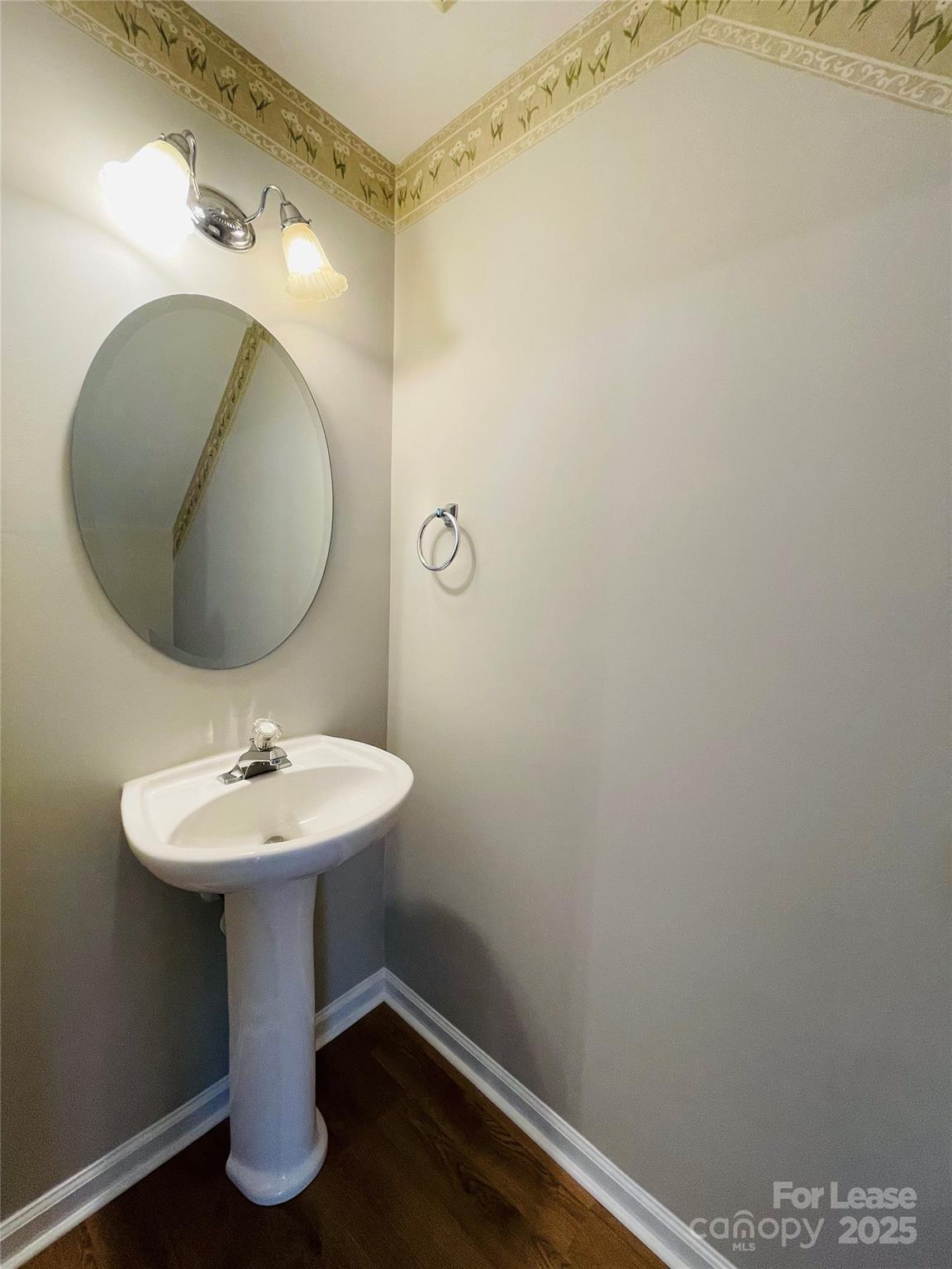 724 Shellstone Place Fort Mill, SC 29708 - Photo 16 of 17 a bathroom with a sink a mirror and vanity
