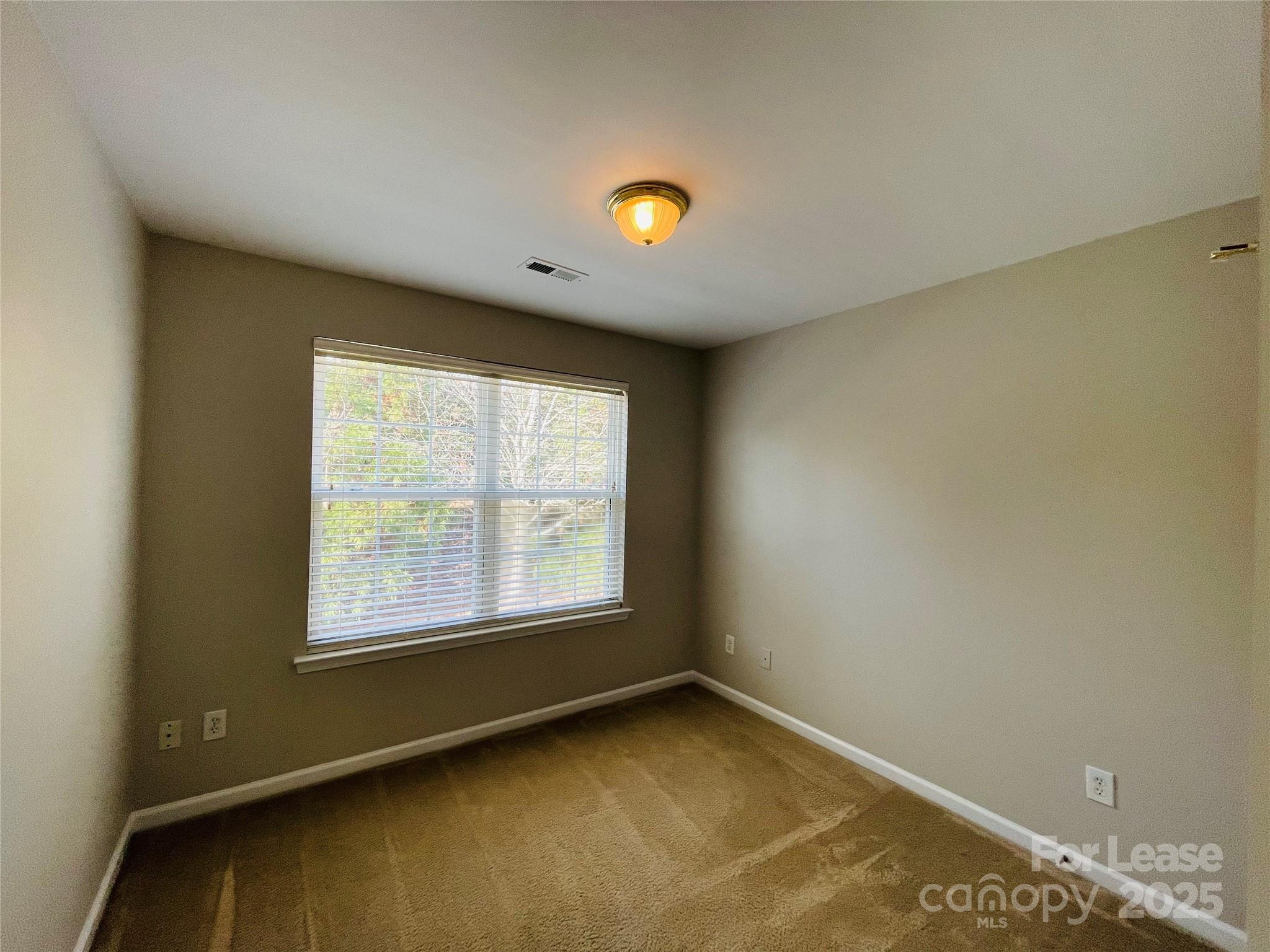 724 Shellstone Place Fort Mill, SC 29708 - Photo 10 of 17 an empty room with a window