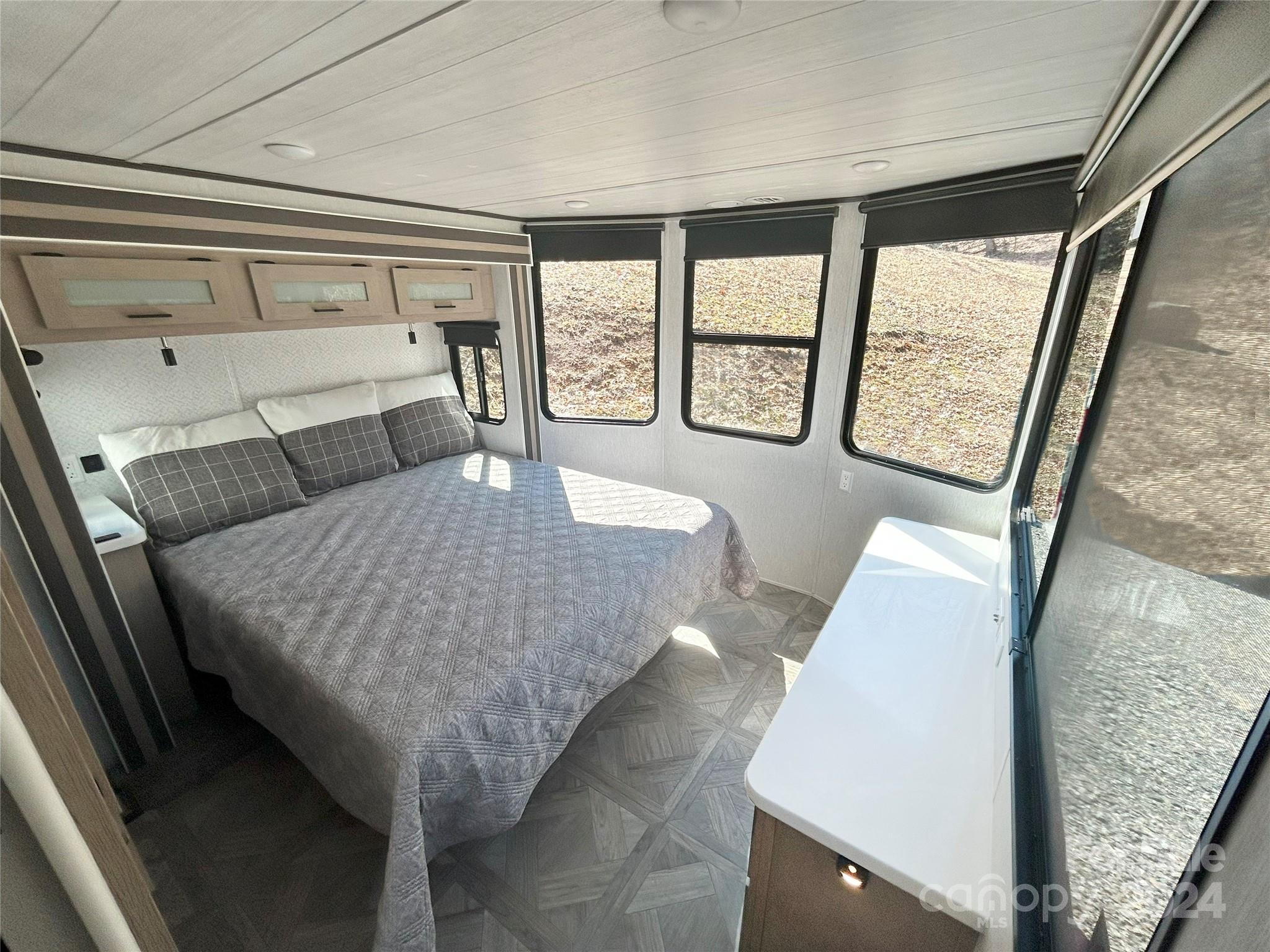 3280 Laurel Valley Road Mars Hill, NC 28754 - Photo 15 of 21 a living room with furniture and a large window