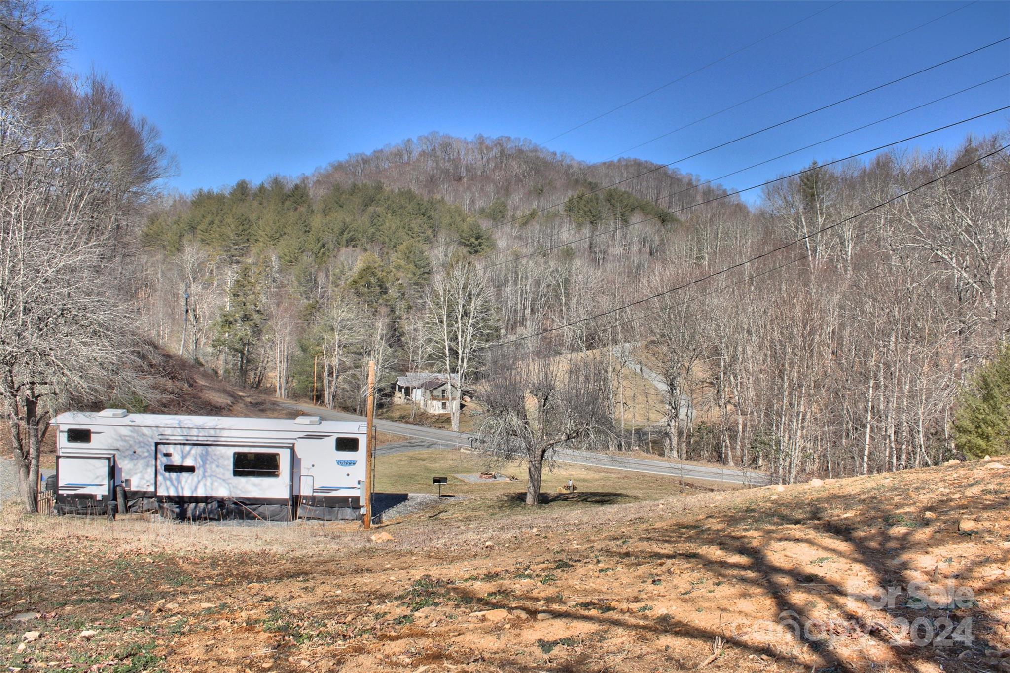 3280 Laurel Valley Road Mars Hill, NC 28754 - Photo 20 of 21 a view of a house with a yard