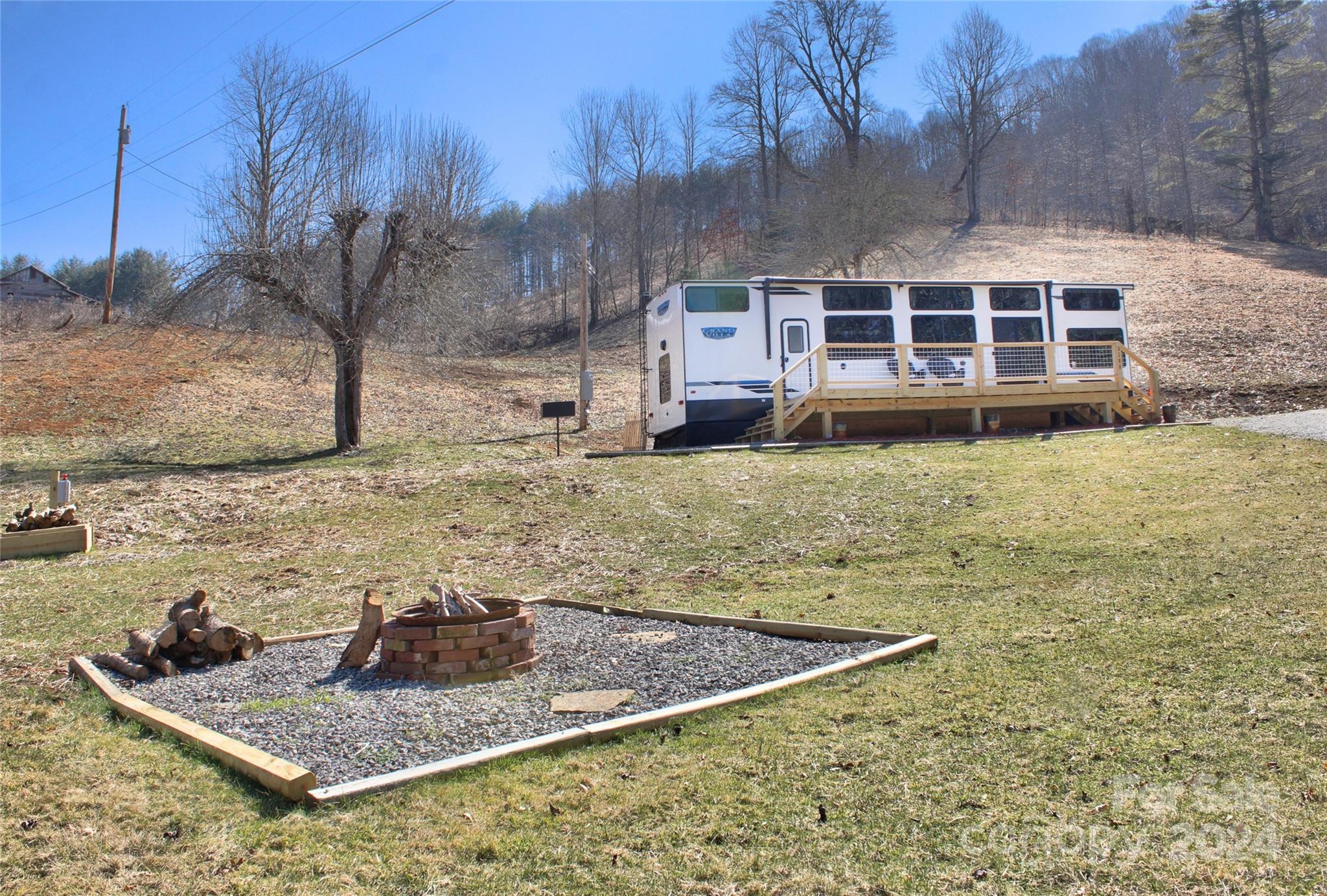 3280 Laurel Valley Road Mars Hill, NC 28754 - Photo 2 of 21 a view of a house with pool
