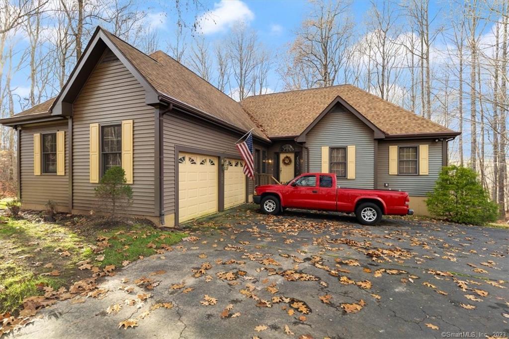 223 Fishing Brook Road Westbrook, CT 06498 - Photo 1 of 1 a view of a house with a yard