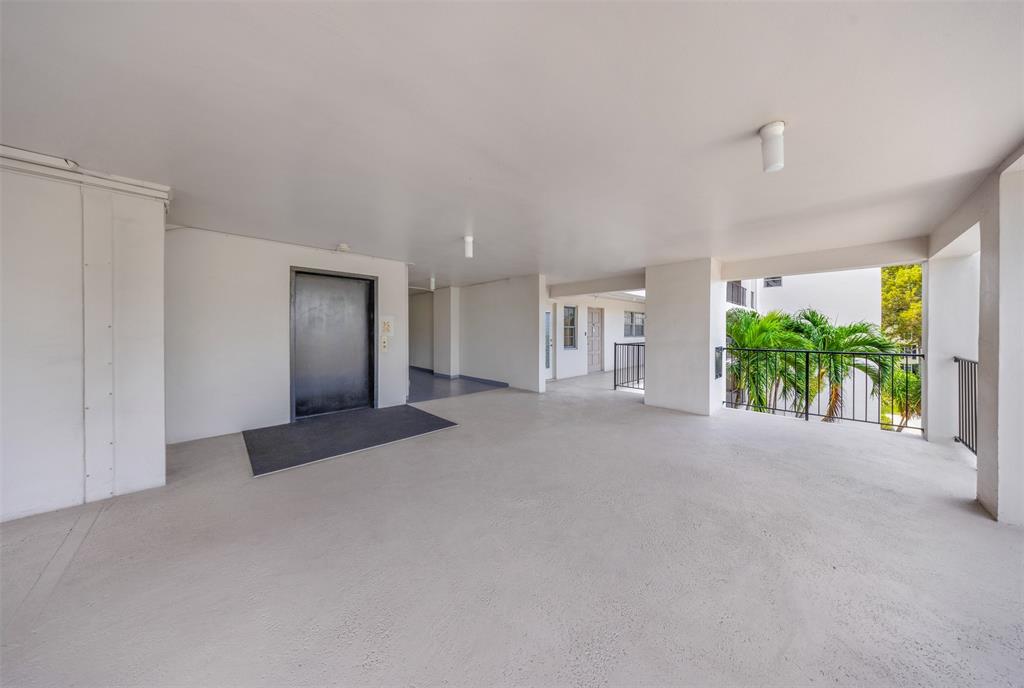 3000 North Palm Aire Drive, Unit 302 Pompano Beach, FL 33069 - Photo 23 of 23 a view of a room with window and outdoor view