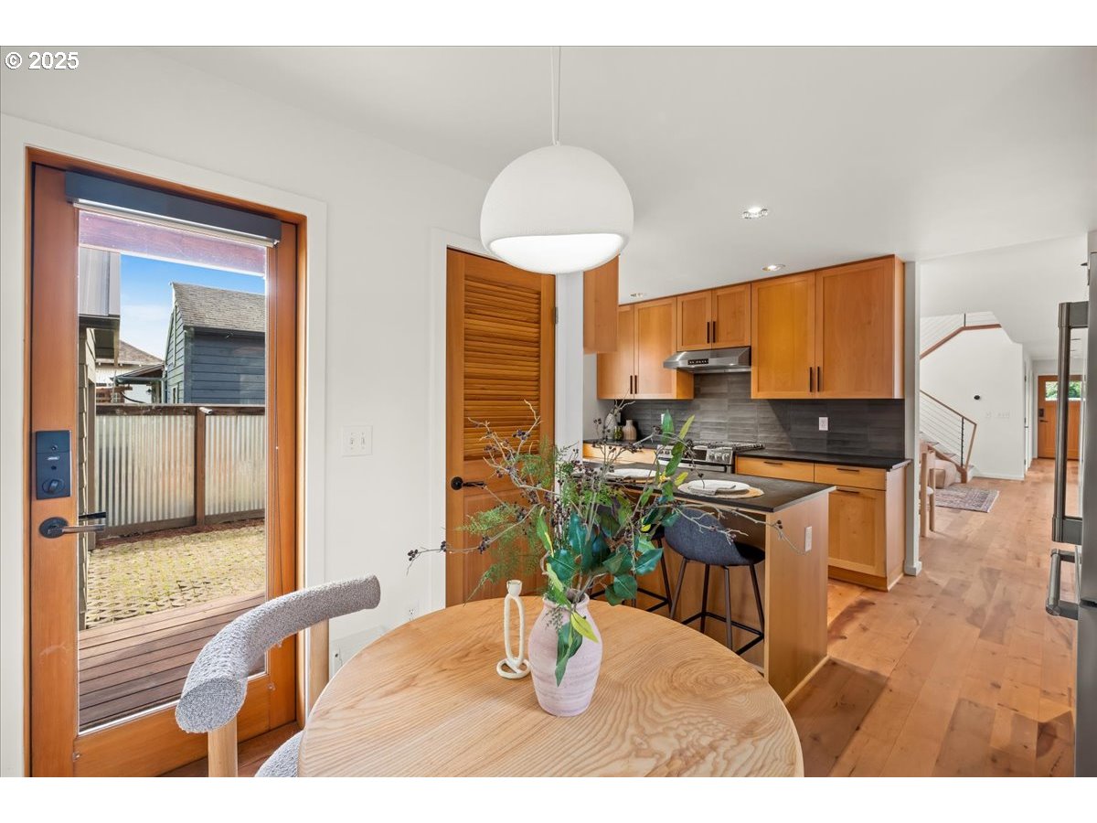 8316 Southeast 7th Avenue Portland, OR 97202 - Photo 14 of 44 a kitchen with a sink appliances and cabinets