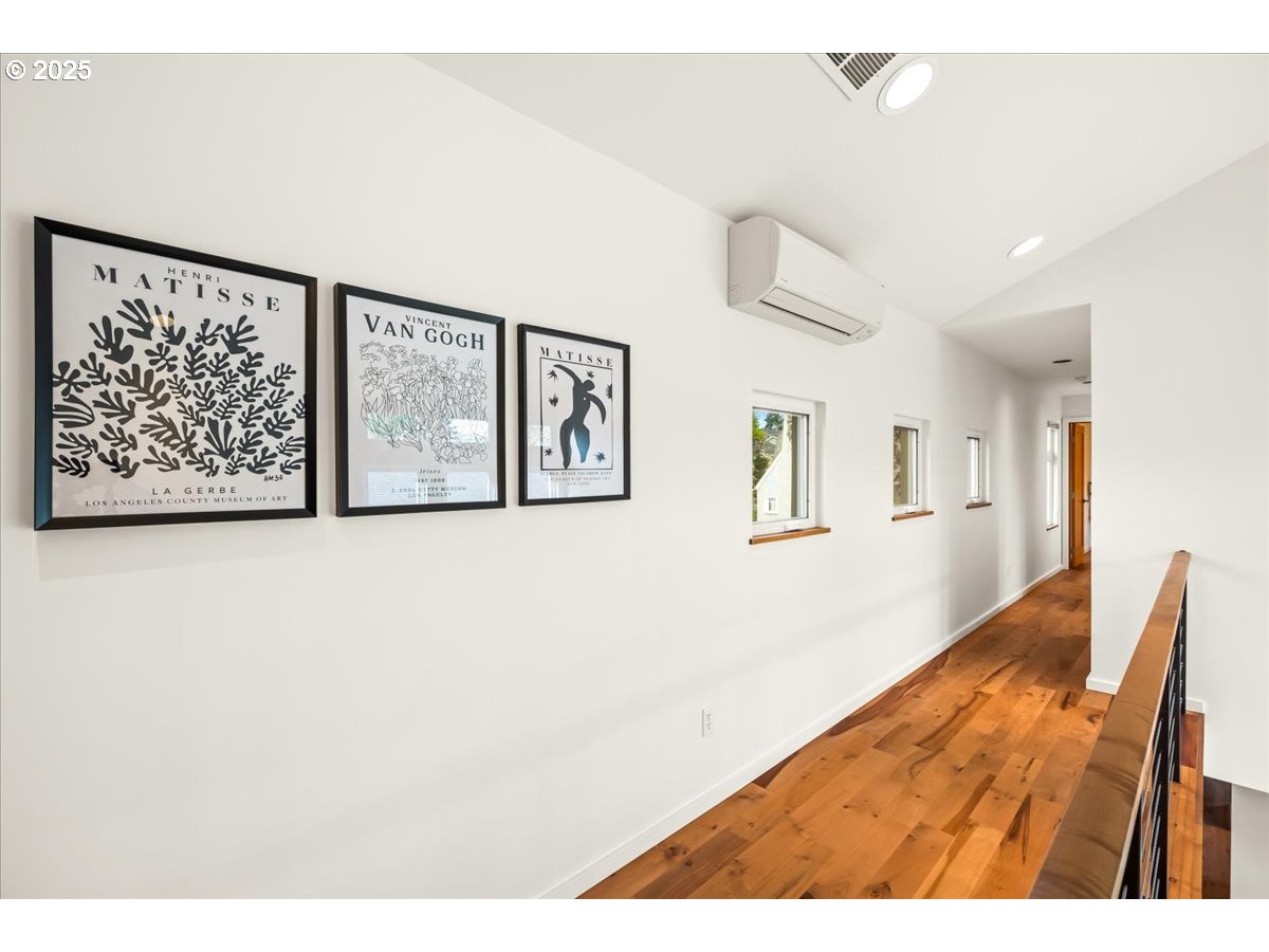 8316 Southeast 7th Avenue Portland, OR 97202 - Photo 24 of 44 a view of livingroom with furniture and wooden floor
