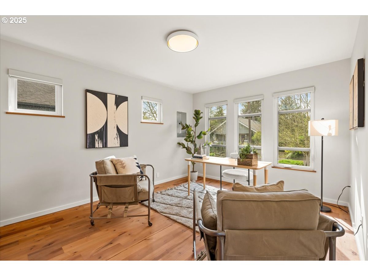8316 Southeast 7th Avenue Portland, OR 97202 - Photo 29 of 44 a living room with furniture and a window