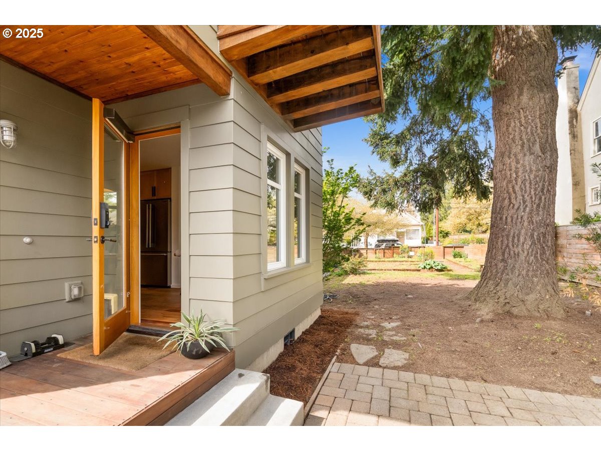 8316 Southeast 7th Avenue Portland, OR 97202 - Photo 34 of 44 a view of a house with a yard